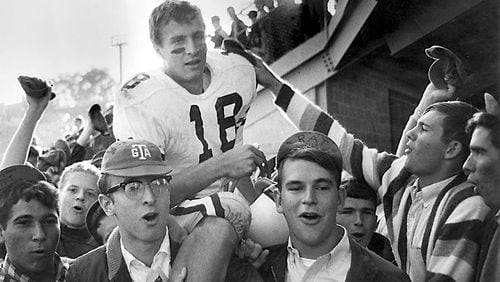 Georgia Tech quarterback Kim King cheered on by Tech students after game. King played at Tech from 1965-67.  (Photo courtesy of Georgia Tech)