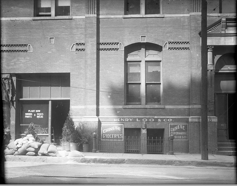 In 1927, the Henry Loo and Company store sat at 88 Hunter Street SW in Atlanta and sold much more than groceries, according to the storefont signs. That address is today's Martin Luther King, Jr. Drive, within a few blocks of the State Capitol. (Fulton County Public Library, Special Collections)