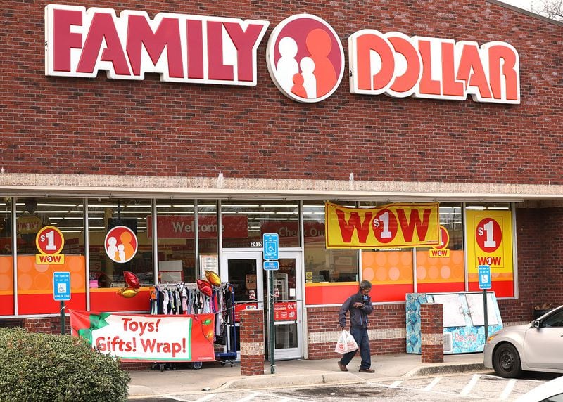 A customer leaves the Family Dollar at the intersection of Covington Highway and DeKalb Medical Parkway in Lithonia on Dec. 16, 2019. Three different dollar stores are located at that intersection. The city of Stonecrest has passed a measure banning new dollar stores from coming to the city, with leaders arguing the stores project a negative image. (Curtis Compton/ccompton@ajc.com)