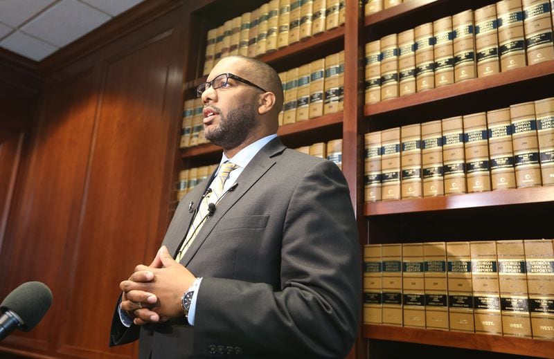 Henry County District Attorney Darius Pattillo speaks with the media after Jacob Kosky pleaded guilty in a 2016 quadruple homicide Friday. EMILY HANEY / emily.haney@ajc.com