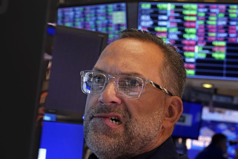 Specialist Anthony Matesic works at his post on the floor of the New York Stock Exchange, Friday, Aug. 16, 2024. (AP Photo/Richard Drew)