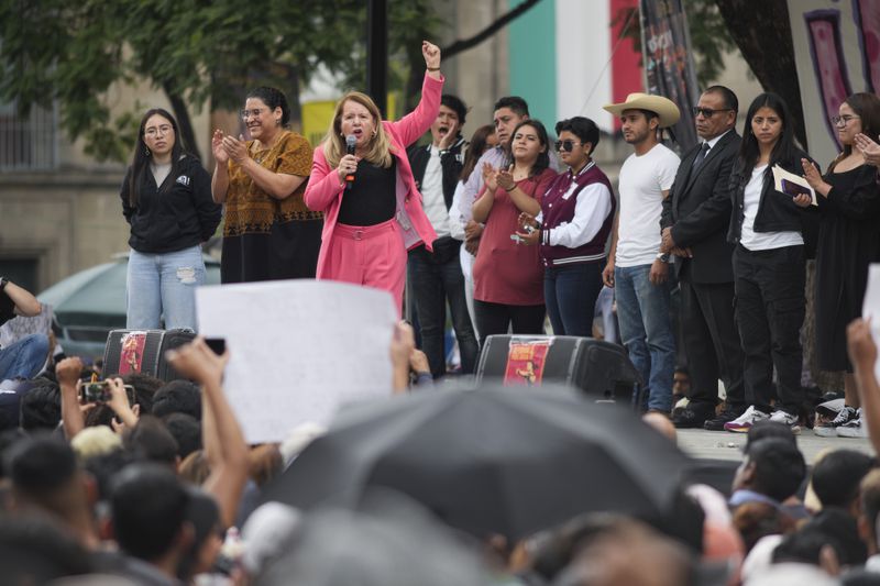 Justice Minister Lorreta Ortiz speaks during a rally in favor of the government's proposed judicial reform outside the Supreme Court building in Mexico City, Thursday, Sept. 5, 2024. (AP Photo/Eduardo Verdugo)