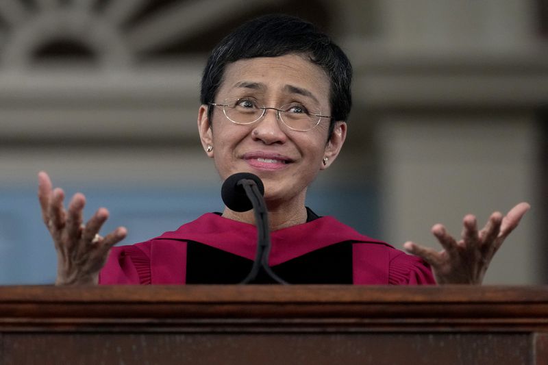 Keynote speaker Maria Ressa, a journalist and advocate for freedom of the press, addresses graduates in Harvard Yard during commencement at Harvard University, Thursday, May 23, 2024, in Cambridge, Mass. (AP Photo/Charles Krupa)