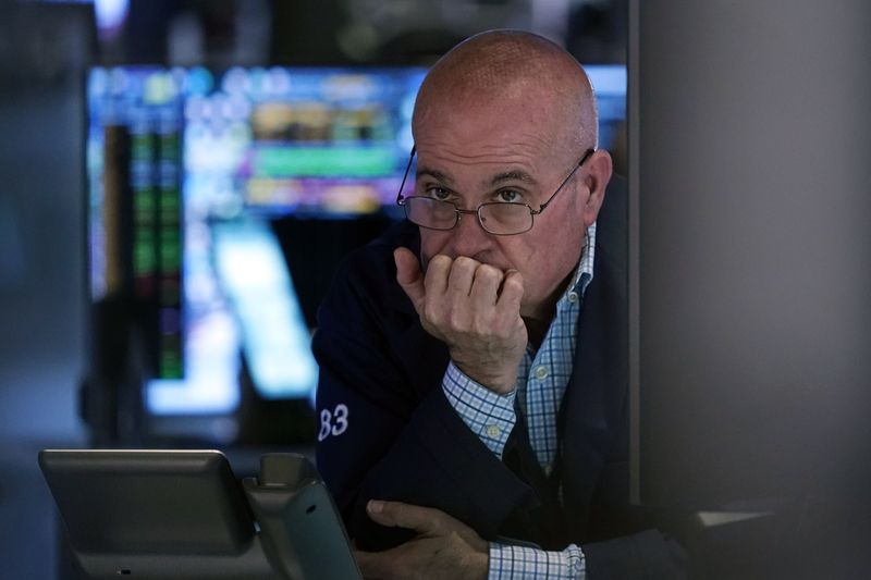 Trader Anthony Confusione works on the floor of the New York Stock Exchange, Thursday, May 30, 2024. Most U.S. stocks are rising following mixed profit reports from big companies and signals that the economy may be cooling. (AP Photo/Richard Drew)