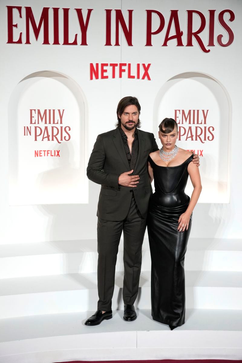 Lucas Bravo and Camille Razat arrive at the premiere of "Emily in Paris", in Rome, Tuesday, Sept. 10, 2024. (AP Photo/Andrew Medichini)