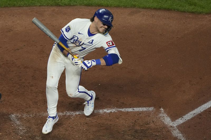 Kansas City Royals' Bobby Witt Jr. reacts after being hit by a pitch thrown by Detroit Tigers starting pitcher Tarik Skubal during the fifth inning of a baseball game Wednesday, Sept. 18, 2024, in Kansas City, Mo. (AP Photo/Charlie Riedel)