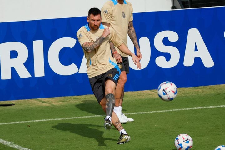 Argentina’s superstar Lionel Messi kicks a ball as his team prepares to face Canada. 
(Miguel Martinez / AJC)