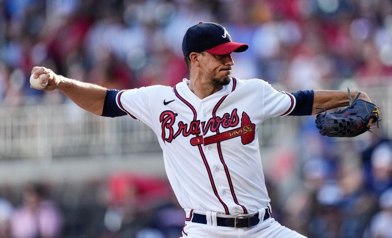 ATLANTA, GA - JULY 31: Atlanta Braves relief pitcher AJ Minter (33) during  the Monday evening MLB game between the Los Angeles Angels and the Atlanta  Braves on July 31, 2023 at