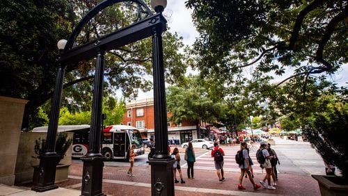 Athens is divided by confusing political district lines, and the results of the 2020 census could be used to redraw the maps to favor one political party over another even more. The current map places the Arch on the campus of the University of Georgia in one state House district and College Square Plaza in another. “This is gerrymandering 101,” said Charles Bullock, a University of Georgia political science professor and author of the book “Redistricting: The Most Political Activity in America.”  (Jenni Girtman for The Atlanta Journal-Constitution)