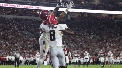 Alabama defensive back Zabien Brown (2) intercepts a pass intended for Georgia wide receiver Colbie Young (8) during the fourth quarter at Bryant-Denny Stadium, Saturday, Sept. 28, 2024, in Tuscaloosa, Al. Alabama won 41-34. (Jason Getz / AJC)