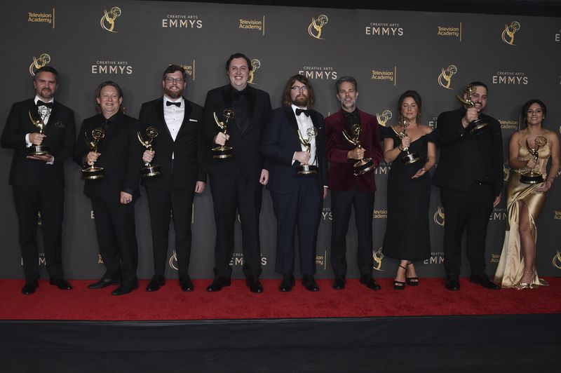 From left, Brian J. Armstrong, Benjamin Cook, James Gallivan, John Creed, Mark Hailstone, Ken Cain, Melissa Muil, Matt Salib and Sanaa Kelley pose with the award for Outstanding Sound Editing for a Comedy or Drama Series (One-Hour) for Shogun during night two of the Creative Arts Emmy Awards on Sunday, Sept. 8, 2024, in Los Angeles. (Photo by Richard Shotwell/Invision/AP)