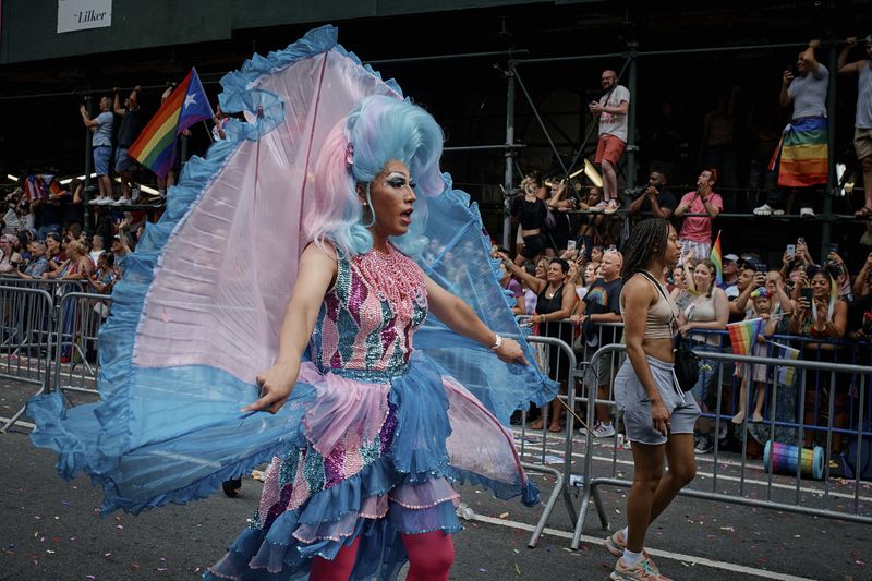 A reveler marches during the NYC Pride March, Sunday, June 30, 2024, in New York. (AP Photo/Andres Kudacki)