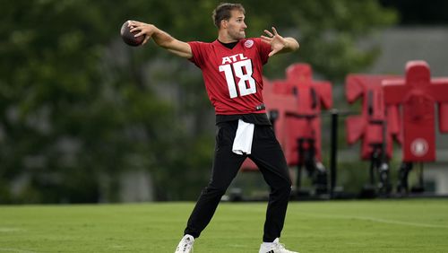Atlanta Falcons quarterback Kirk Cousins throws during an NFL training camp football practice Thursday, July 25, 2024, in Flowery Branch, Ga. (AP Photo/John Bazemore)