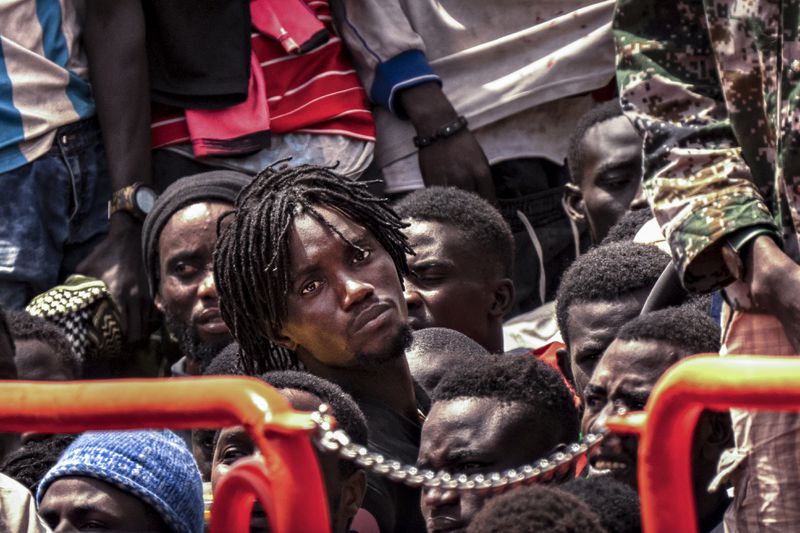 Migrants disembark at the port of on "La Estaca" in Valverde at the Canary island of El Hierro, Spain, Monday, Aug. 26, 2024. Migrants arrived by boat after a thirteen-day voyage from the coast of Senegal. (AP Photo/Maria Ximena)