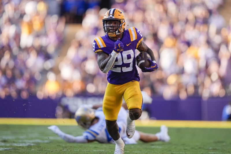 LSU running back Caden Durham (29) runs for a touchdown in the second half of an NCAA college football game in Baton Rouge, La., Saturday, Sept. 21, 2024. LSU won 34-17. (AP Photo/Gerald Herbert)