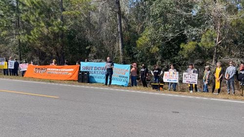 Protesters rally in front of the Folkston immigration detention complex on Thursday, March 3, 2022.