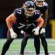 Atlanta Falcons offensive tackle Storm Norton (77) lines up during the second half of an NFL football game against the Houston Texans, Sunday, Oct. 8, 2023, in Atlanta. The Atlanta Falcons won 21-19. (AP Photo/Danny Karnik)