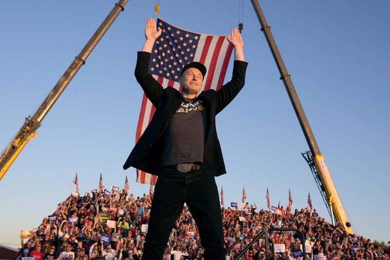 Tesla and SpaceX CEO Elon Musk walks to the stage to speak alongside Republican presidential nominee former President Donald Trump at a campaign event at the Butler Farm Show, Saturday, Oct. 5, 2024, in Butler, Pa. (AP Photo/Alex Brandon)