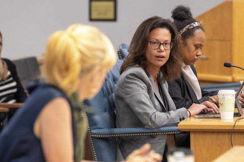 OceanGate's representative look on during Amber Bay, Former OceanGate Director of Administration's testimony at the Titan marine board of investigation hearing inside the Charleston County Council Chambers Tuesday, Sept. 24, 2024, in North Charleston, S.C. (Corey Connor via AP, Pool)