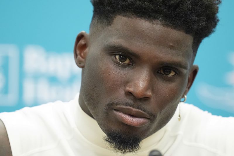 Miami Dolphins wide receiver Tyreek Hill speaks to journalists following a team practice, Wednesday, Sept. 11, 2024, in Miami Gardens, Fla. (AP Photo/Rebecca Blackwell)