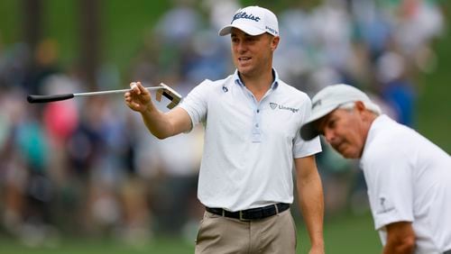 Justin Thomas talks with Fred Couples as they putt on the sixth green during the practice round for the 2023 Masters Tournament at Augusta National Golf Club, Tuesday, April 4, 2023, in Augusta, Ga. Jason Getz / Jason.Getz@ajc.com)
