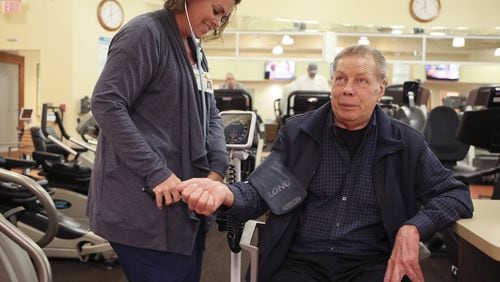 Nurse Amber Boyle checks the blood pressure of Bob Falat, 72, of Lockport, Ill. at the Cardiopulmonary Rehab Center at Silver Cross Hospital in New Lenox on Thursday, May 17, 2018. Falat, who suffered from COPD, received a new lung on January 10. (Stacey Wescott/Chicago Tribune/TNS)