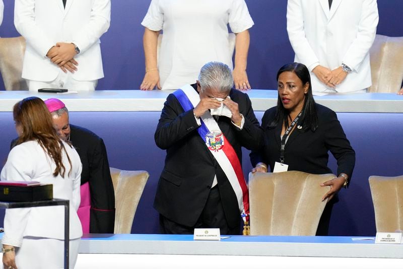 New Panamanian President Jose Raul Mulino cries at his swearing-in ceremony at the Atlapa Convention Centre in Panama City, Monday, July 1, 2024. (AP Photo/Matias Delacroix)