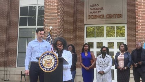 U.S. Sen. Jon Ossoff, D-Ga., (left) listens as Spelman College President Mary Schmidt Campbell delivers remarks on the campus on April 20, 2022. (Eric Stirgus/eric.stirgus@ajc.com)