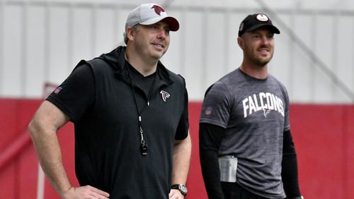 Atlanta Falcons head coach Arthur Smith (left) smiles during rookie minicamp at Atlanta Falcons Training Facility, Friday, May 12, 2023, in Flowery Branch. (Hyosub Shin / Hyosub.Shin@ajc.com)