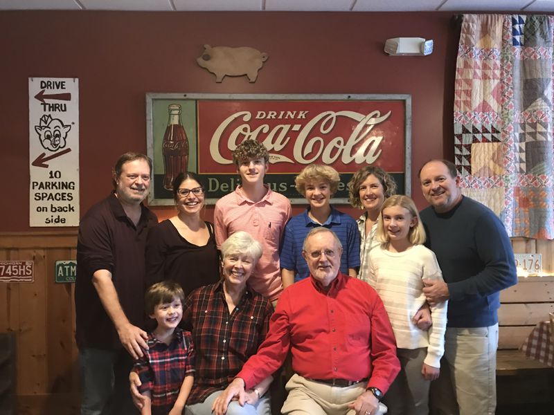McDaniel's QN2 has become a family affair. Pictured are Andy, Jamie, Baker, Peter, Jeanne, Ella and Glenn on the back row, and Jacob, Diane and Bob on the front row. Courtesy of McDaniel’s QN2 BBQ
