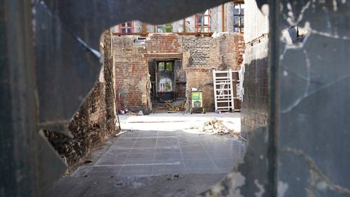 Remains of Copenhagen's Old Stock Exchange building are seen through a broken glass window in Copenhagen, Denmark, Thursday, Sept. 19, 2024. (AP Photo James Brooks)