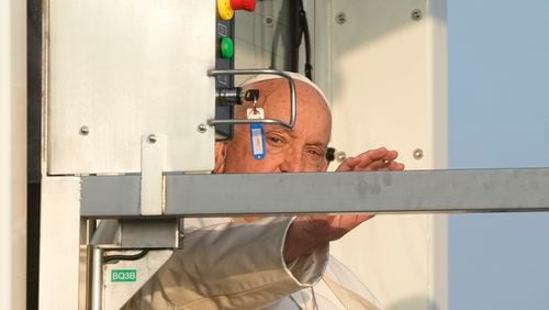 Pope Francis arrives at Fiumicino International airport Leonardo da Vinci, some 30 kilometers south-west of Rome, Thursday, Sept. 26, 2024 to board the papal flight to Luxembourg for a four-day visit to Luxembourg and Belgium. (AP Photo/Gregorio Borgia)