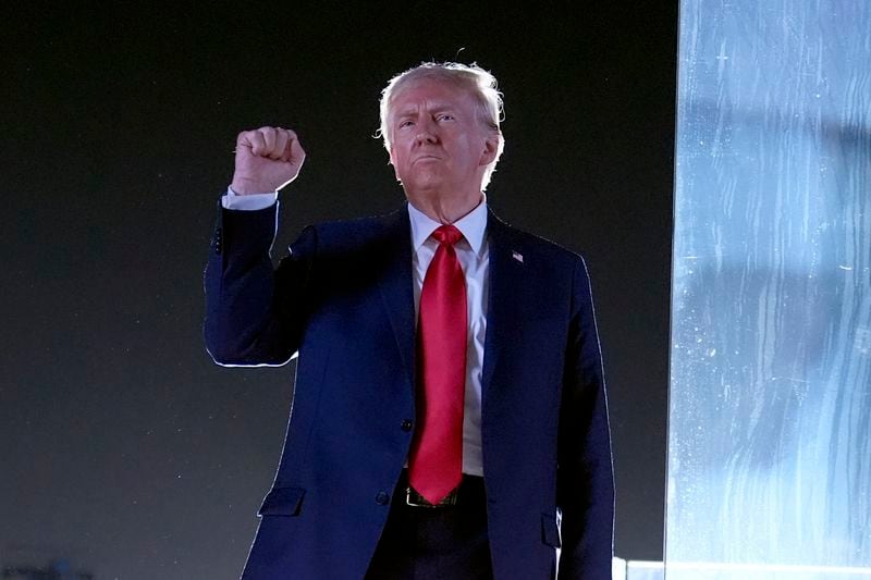 Republican presidential nominee former President Donald Trump gestures as he concludes speaking at a campaign event at the Butler Farm Show, Saturday, Oct. 5, 2024, in Butler, Pa. (AP Photo/Alex Brandon)