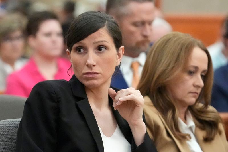 Kouri Richins, a Utah mother of three who wrote a children's book about coping with grief after her husband's death and was later accused of fatally poisoning him, looks on during a hearing Monday, Aug. 26, 2024, in Park City, Utah. (AP Photo/Rick Bowmer, Pool)