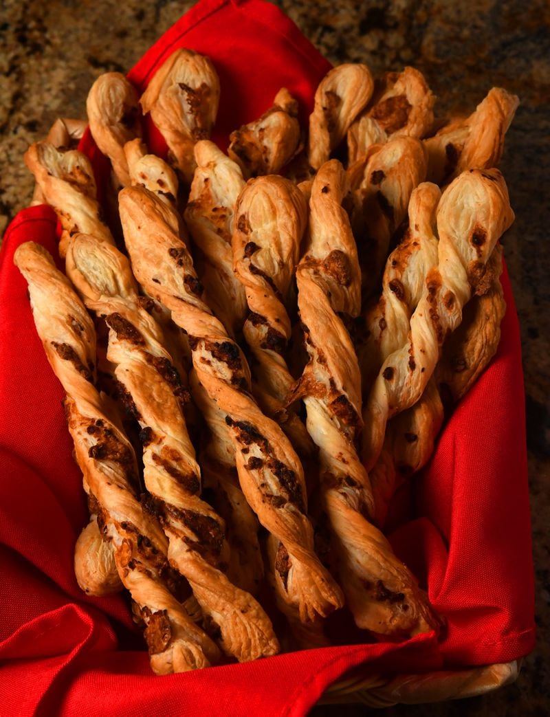 Akawi Twists (puff pastry with cheese) are often part of the Thanksgiving plan for sisters Farrah Haidar and Hala Yassine. (Styling by Farrah Haidar and Hala Yassine / Chris Hunt for the AJC)