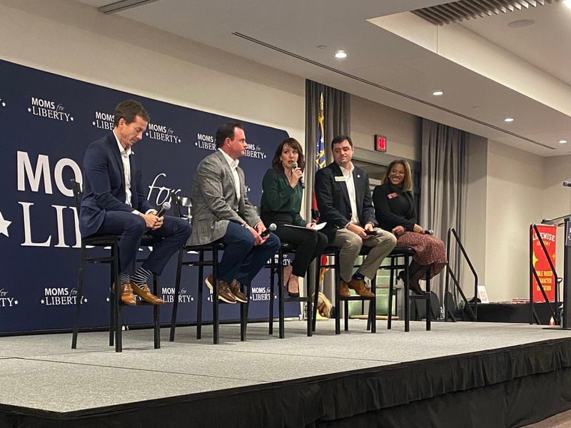 Georgia lawmakers Sen. Greg Dolezal, Sen. Clint Dixon, Rep. Scott Hilton and Rep. Mesha Mainor participated in a panel discussion led by Moms for Liberty founder Tina Descovich (center) on Nov. 13 at the Gas South Convention Center in Duluth.