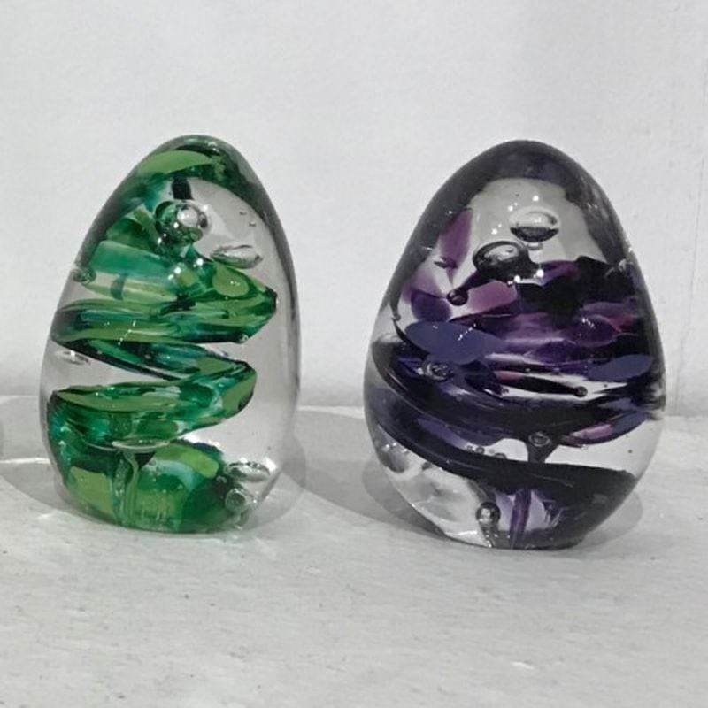 Make an egg-shaped paperweight with instruction from professional glass blowers at Decatur Glassblowing.