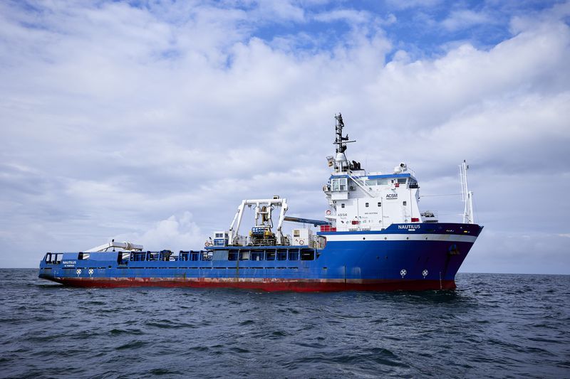 The vessel Nautilus works in the Pacific Ocean near Newport, Ore., Friday, Aug. 23, 2024, where it helped bury the subsea cables that run along the ocean floor to connect the wave energy test site to facilities on land. (AP Photo/Craig Mitchelldyer)