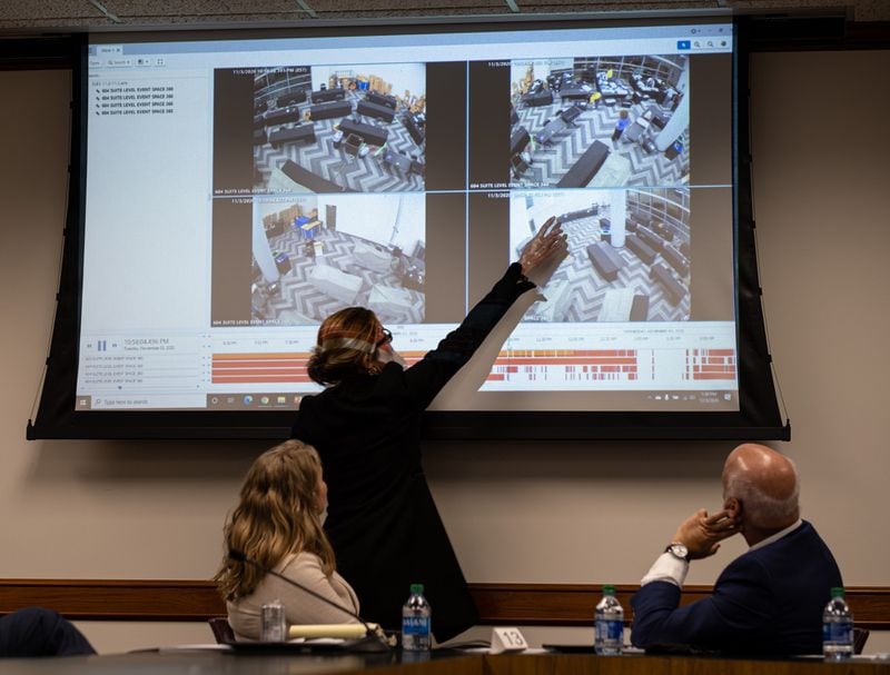 Jacki Pick points out what she considered suspicious activity on surveillance video of the Fulton County absentee vote counting room as she and Rudy Giuliani appeared before a subcommittee of the state Senate Judiciary Committee in December. Ben Gray for the Atlanta Journal-Constitution