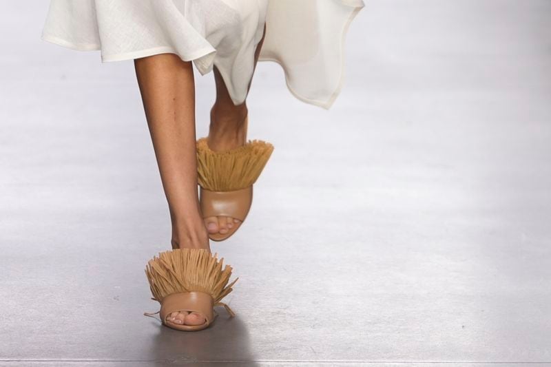 A model walks the runway during the Michael Kors Collection spring/summer 2025 fashion show as part of New York Fashion Week, Tuesday, Sept. 10, 2024, in New York. (AP Photo/Pamela Smith)