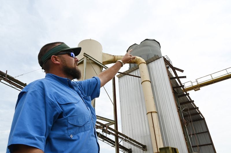 Carl Dixon II shows damage caused by Hurricane Helene at Dixon Farm Supply, Tuesday, October 1, 2024, in Alapaha. (Hyosub Shin / AJC)