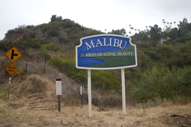 A city limits sign is displayed Thursday, Sept. 12, 2024, Malibu, Calif. (AP Photo/Eric Thayer)