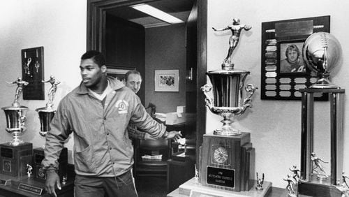 Herschel Walker leaves Vince Dooley's office after a meeting. W.A. Bridges Jr. / AJC file photo