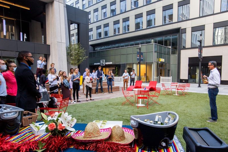 Midtown's Colony Square at the corner of Peachtree Street and 14th Street opens newly renovated space to the public that is open air with green space and additional loft office space. North American Properties celebrated the opening on Tuesday, Oct 6, 2020 with Mark Toro, the chairman of the board in Altanta, offering a Tequila Blessing, a tradition for the team that has been working on the project since 2015.  The first public event in the new space is a dueling piano performance at the venue's weekly Groovin' on The Square at 6 pm on Friday, Oct 9, 2020. (Jenni Girtman for the Atlanta Journal-Constitution)