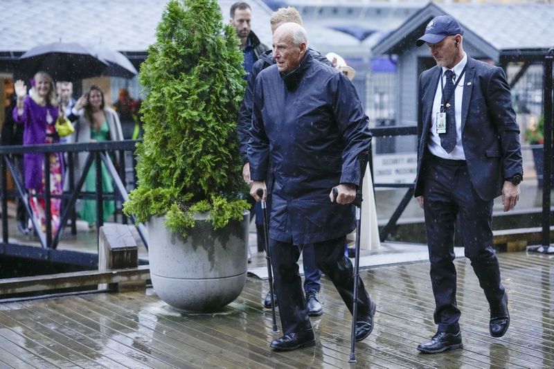 Norway's King Harald arrives for a theme party at Hotel Union in Geiranger, Norway, Friday evening, Aug. 30, 2024, the evening before the wedding ceremony of Princess Märtha Louise and Derek Verrett. (Cornelius Poppe/NTB Scanpix via AP)