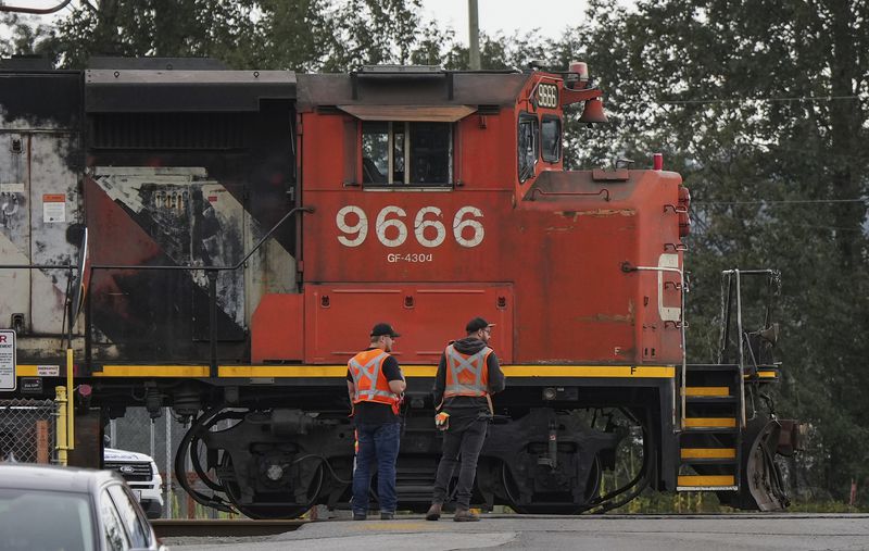 A locomotive is moved by management at Canadian National Rail's Thornton Yard in Surrey, British Columbia, Canada, Thursday, Aug. 22, 2024. (Darryl Dyck/The Canadian Press via AP)