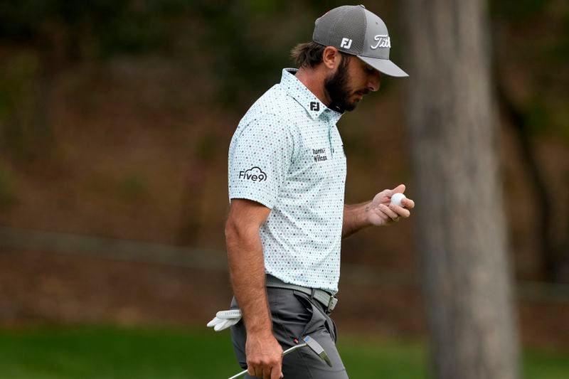 Max Homa walks off the first green after his shot during the first round of the BMW Championship golf event at Castle Pines Golf Club, Thursday, Aug. 22, 2024, in Castle Rock, Colo. (AP Photo/Matt York)