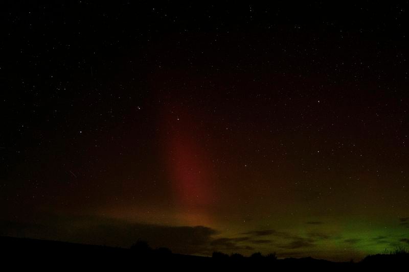 An aurora borealis, also known as the northern lights, is seen in the night sky with the Big Dipper constellation on Tuesday, Sept. 24, 2024, near Washtucna, Wash. (AP Photo/Ted S. Warren)