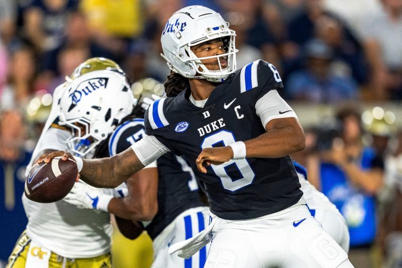 Duke Blue Devils quarterback Maalik Murphy (6) drops back to pass in the first quarter of a football game against the Georgia Tech Yellowjackets, Saturday, Oct. 5, 2024, in Atlanta. (AP Photo/Jason Allen)