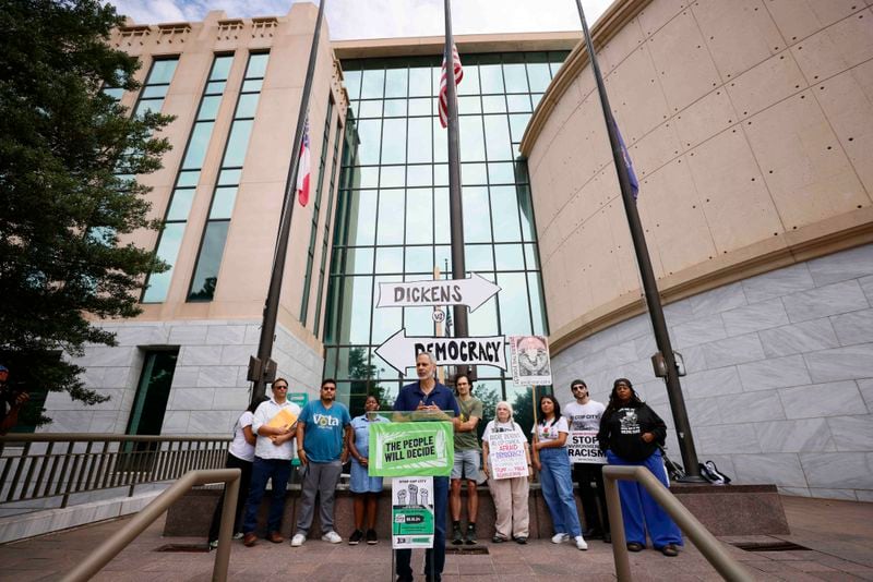 Cop City organizer Kamau Franklin speaks in a press conference outside City Hall, marking the first anniversary of the organizers’ submission of the training center petition on Wednesday, Sept. 11, 2024.
(Miguel Martinez / AJC)